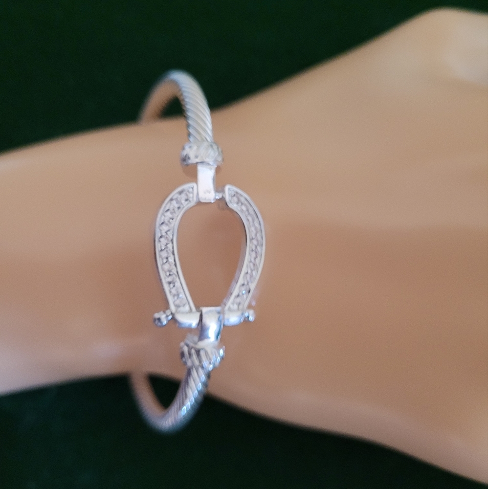 - Silver horse shoe bracelet